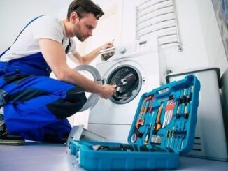 Reparación de lavadoras - Técnico con caja de herramientas a la mano ofrece servicio de reparación de lavadoras a domicilio en CDMX